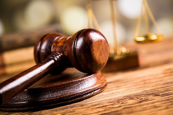 Golden scales of justice with gavel